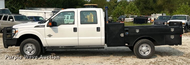 image for item ET3129 2016 Ford F350 Super Duty XL Crew Cab flatbed pickup truck