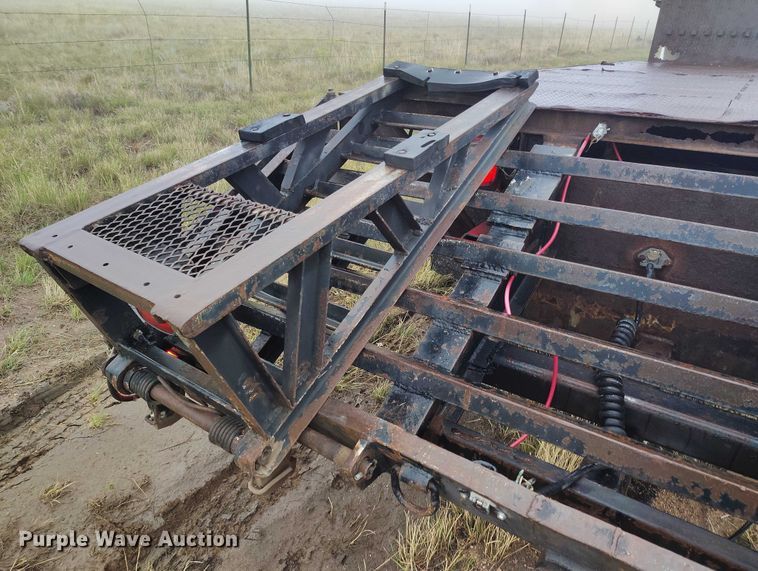 image for item IP9663 2006 Chevrolet C7500 hydraulic tail flatbed truck