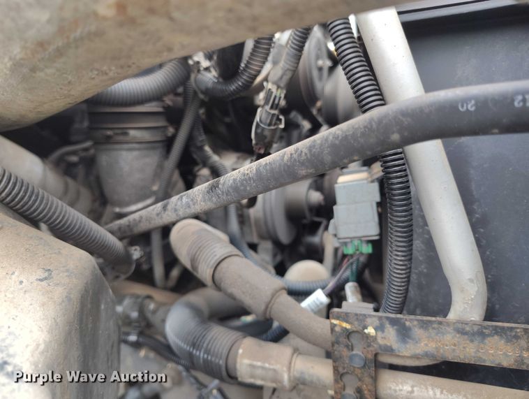 image for item IP9663 2006 Chevrolet C7500 hydraulic tail flatbed truck