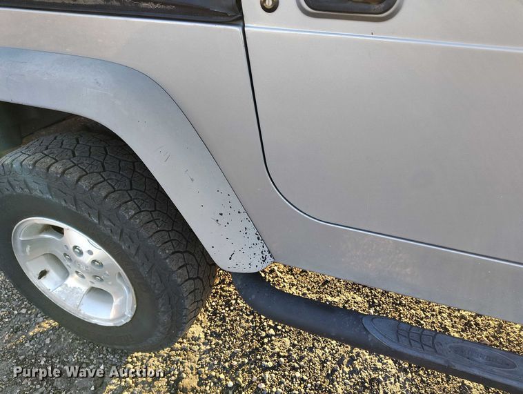 image for item IP9705 2002 Jeep Wrangler Sport SUV