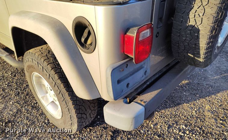 image for item IP9705 2002 Jeep Wrangler Sport SUV