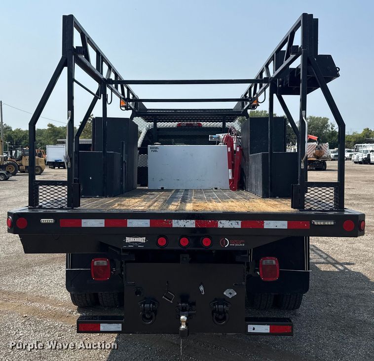 image for item NU9592 2022 Chevrolet Silverado 5500HD Crew Cab flatbed truck