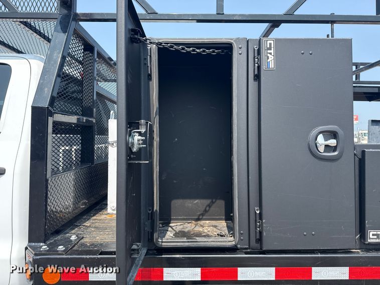 image for item NU9592 2022 Chevrolet Silverado 5500HD Crew Cab flatbed truck