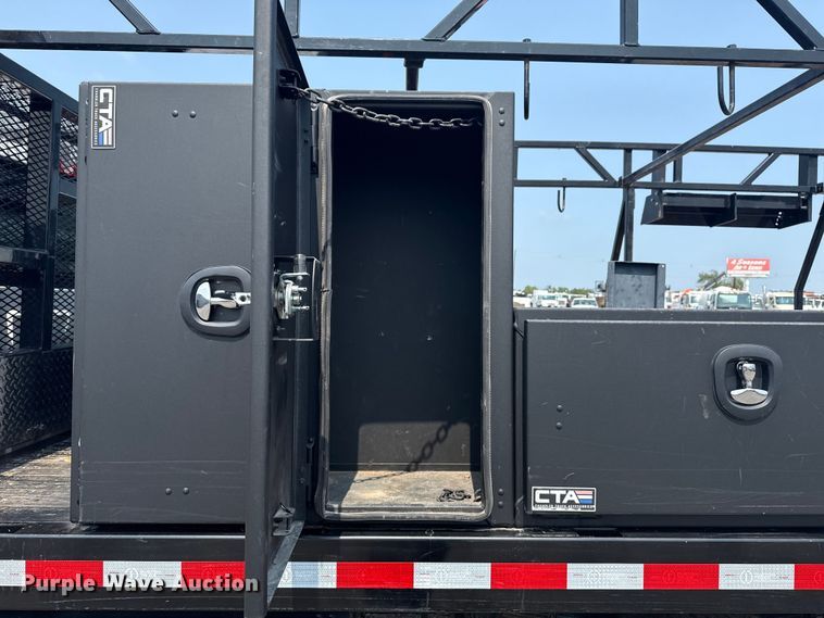 image for item NU9592 2022 Chevrolet Silverado 5500HD Crew Cab flatbed truck