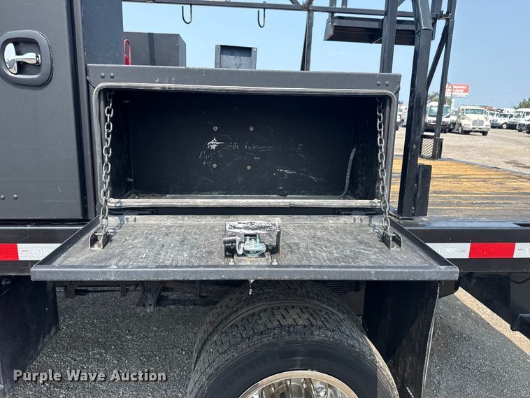 image for item NU9592 2022 Chevrolet Silverado 5500HD Crew Cab flatbed truck