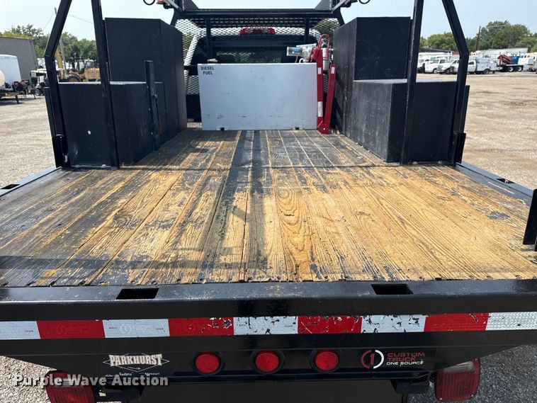 image for item NU9592 2022 Chevrolet Silverado 5500HD Crew Cab flatbed truck