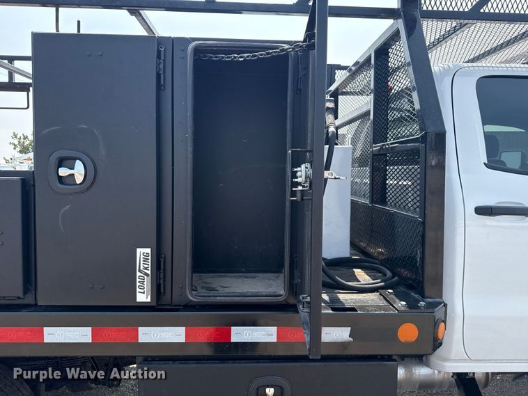 image for item NU9592 2022 Chevrolet Silverado 5500HD Crew Cab flatbed truck