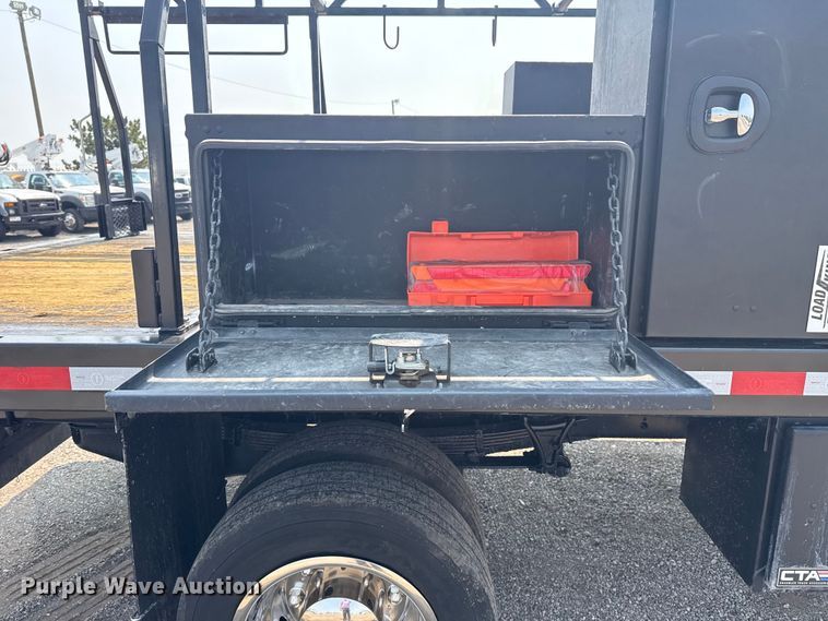 image for item NU9592 2022 Chevrolet Silverado 5500HD Crew Cab flatbed truck