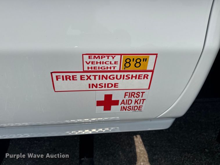 image for item NU9592 2022 Chevrolet Silverado 5500HD Crew Cab flatbed truck