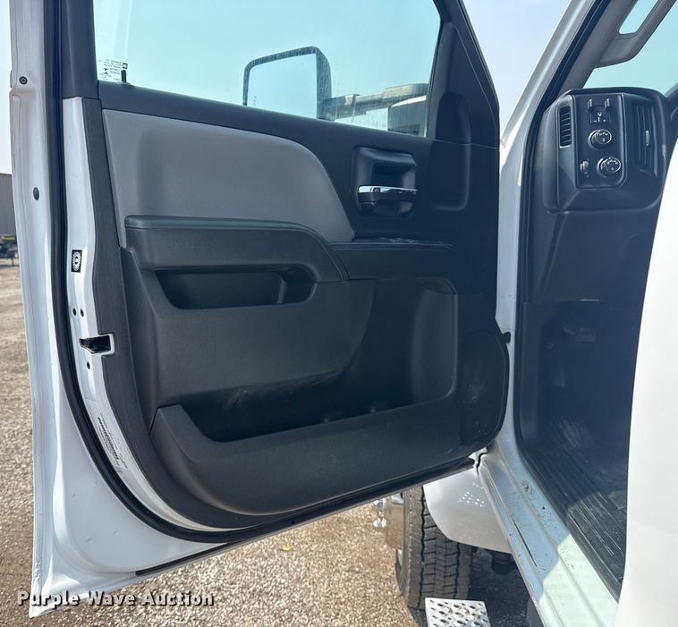 image for item NU9592 2022 Chevrolet Silverado 5500HD Crew Cab flatbed truck