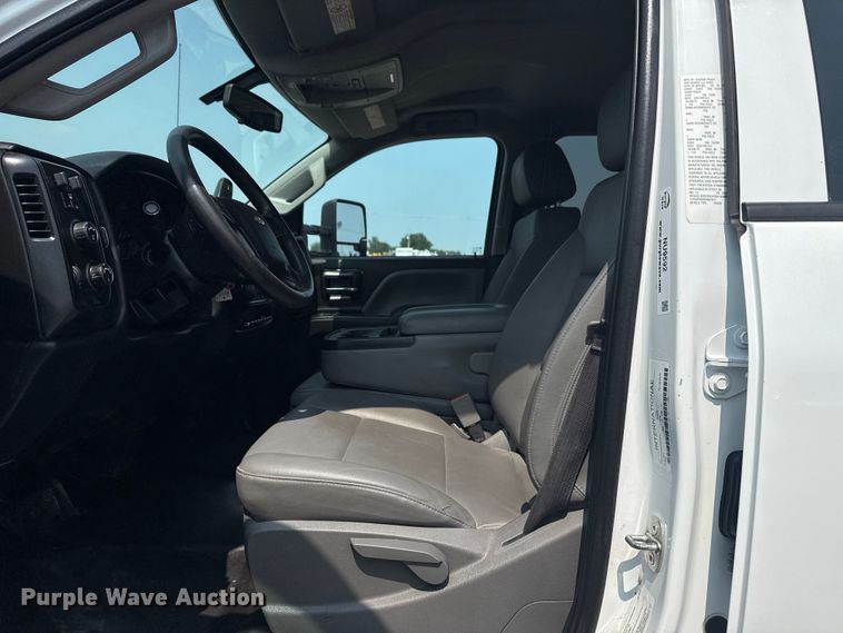 image for item NU9592 2022 Chevrolet Silverado 5500HD Crew Cab flatbed truck