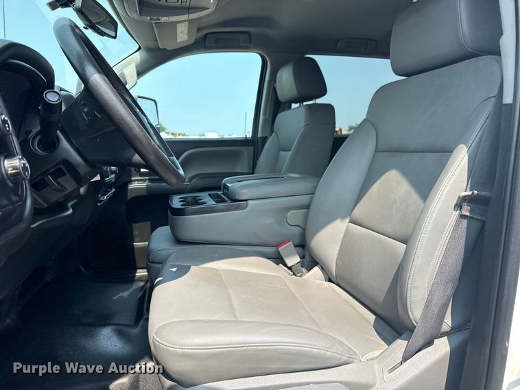 image for item NU9592 2022 Chevrolet Silverado 5500HD Crew Cab flatbed truck