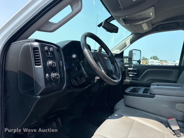 image for item NU9592 2022 Chevrolet Silverado 5500HD Crew Cab flatbed truck