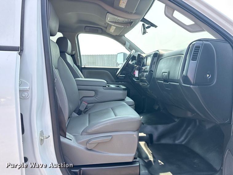 image for item NU9592 2022 Chevrolet Silverado 5500HD Crew Cab flatbed truck