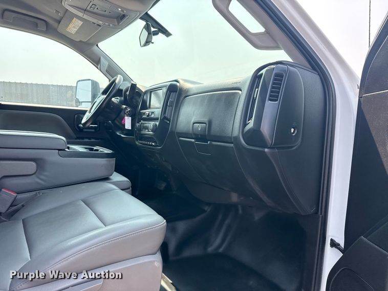 image for item NU9592 2022 Chevrolet Silverado 5500HD Crew Cab flatbed truck