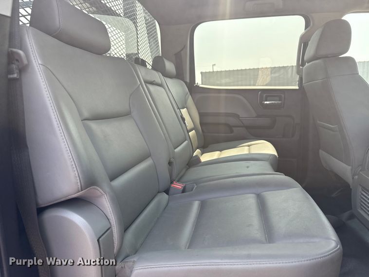 image for item NU9592 2022 Chevrolet Silverado 5500HD Crew Cab flatbed truck