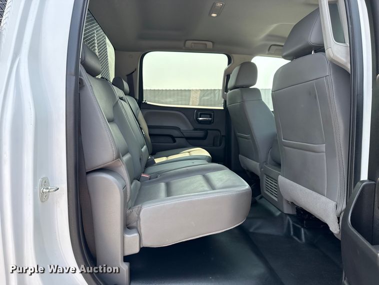 image for item NU9592 2022 Chevrolet Silverado 5500HD Crew Cab flatbed truck