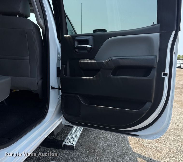 image for item NU9592 2022 Chevrolet Silverado 5500HD Crew Cab flatbed truck