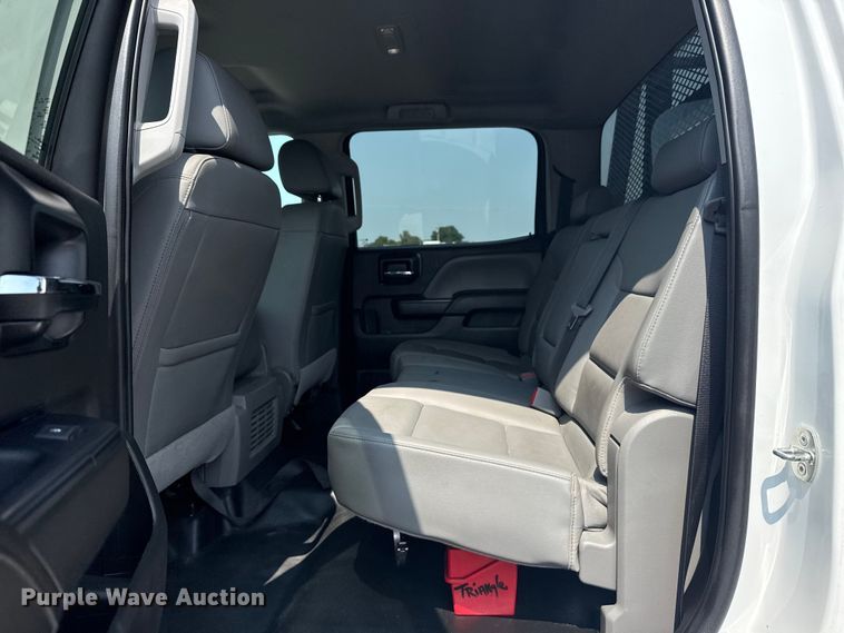 image for item NU9592 2022 Chevrolet Silverado 5500HD Crew Cab flatbed truck