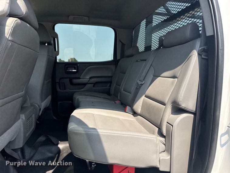 image for item NU9592 2022 Chevrolet Silverado 5500HD Crew Cab flatbed truck