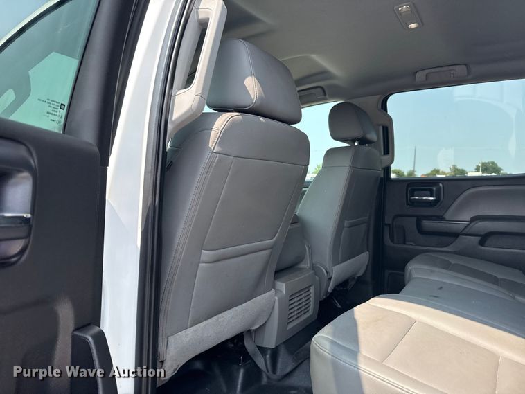 image for item NU9592 2022 Chevrolet Silverado 5500HD Crew Cab flatbed truck