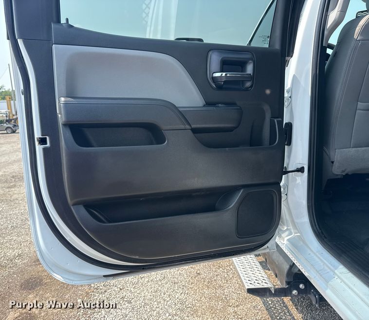 image for item NU9592 2022 Chevrolet Silverado 5500HD Crew Cab flatbed truck