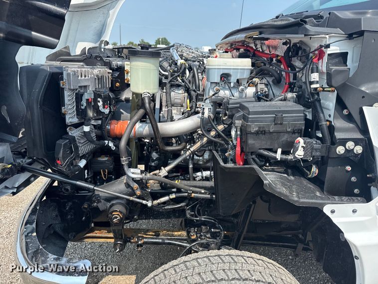 image for item NU9592 2022 Chevrolet Silverado 5500HD Crew Cab flatbed truck