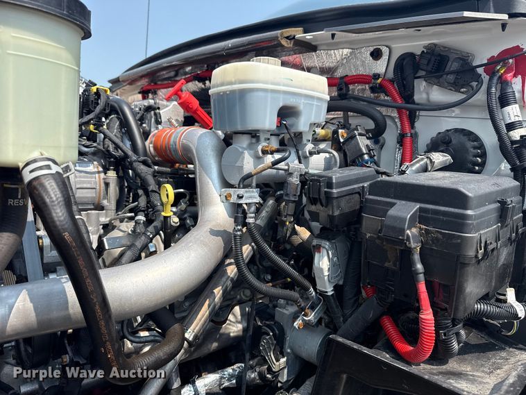 image for item NU9592 2022 Chevrolet Silverado 5500HD Crew Cab flatbed truck