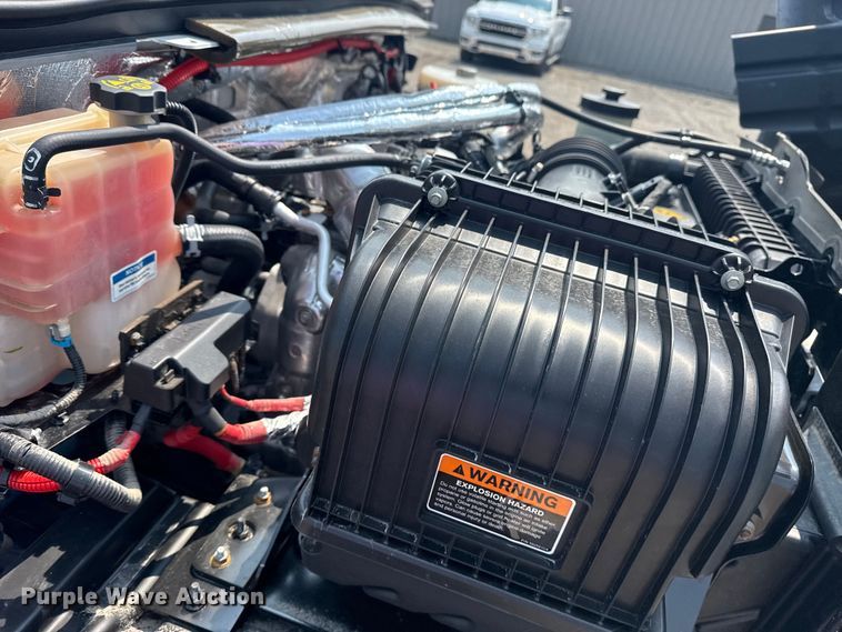 image for item NU9592 2022 Chevrolet Silverado 5500HD Crew Cab flatbed truck