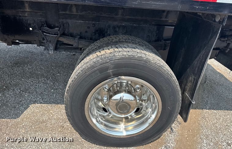 image for item NU9592 2022 Chevrolet Silverado 5500HD Crew Cab flatbed truck