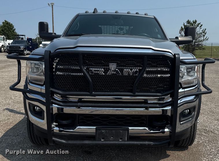 image for item NU9594 2022 RAM 5500 Crew Cab flatbed truck