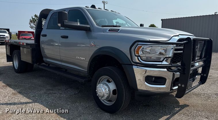 image for item NU9594 2022 RAM 5500 Crew Cab flatbed truck