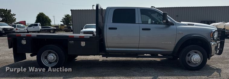image for item NU9594 2022 RAM 5500 Crew Cab flatbed truck