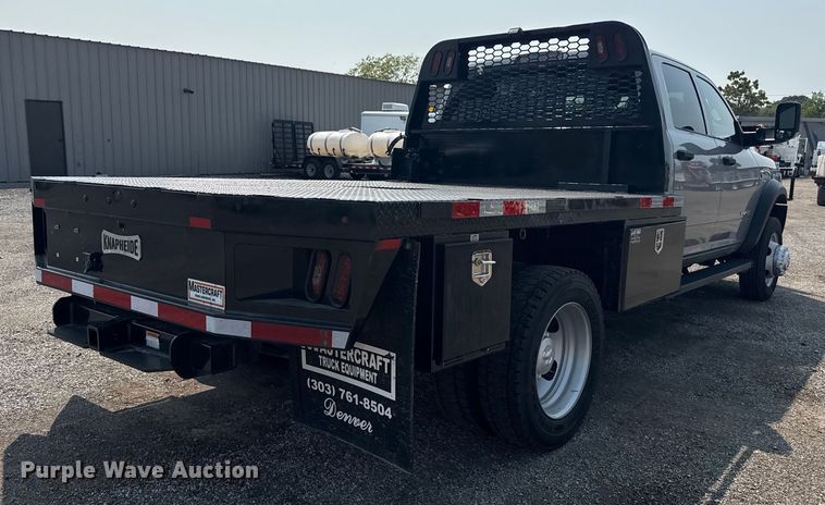 image for item NU9594 2022 RAM 5500 Crew Cab flatbed truck