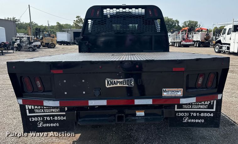 image for item NU9594 2022 RAM 5500 Crew Cab flatbed truck