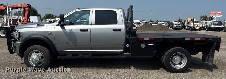 image for item NU9594 2022 RAM 5500 Crew Cab flatbed truck