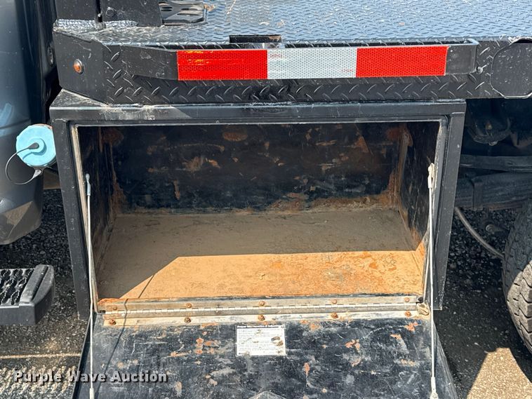 image for item NU9594 2022 RAM 5500 Crew Cab flatbed truck