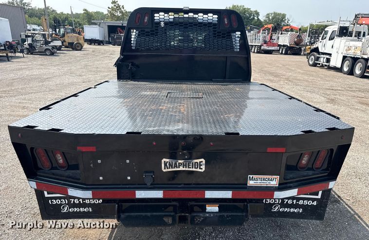 image for item NU9594 2022 RAM 5500 Crew Cab flatbed truck