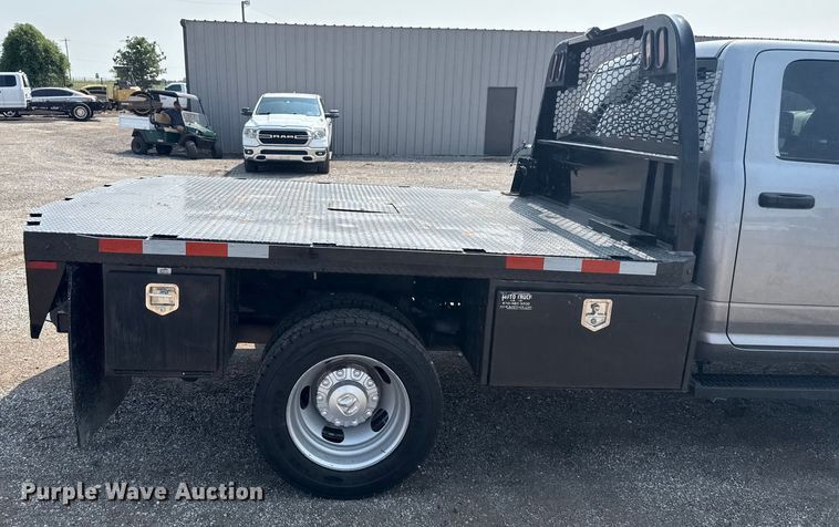 image for item NU9594 2022 RAM 5500 Crew Cab flatbed truck