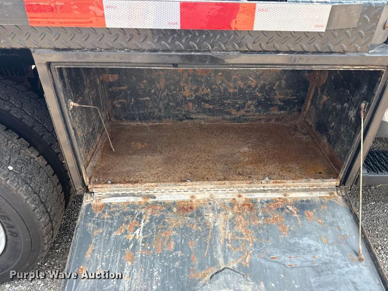 image for item NU9594 2022 RAM 5500 Crew Cab flatbed truck