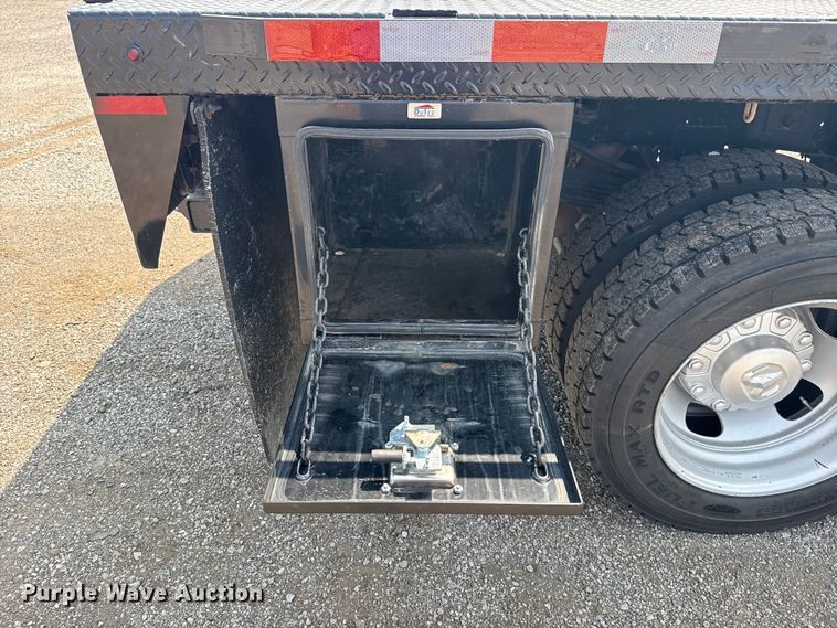 image for item NU9594 2022 RAM 5500 Crew Cab flatbed truck