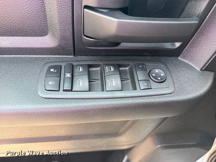 image for item NU9594 2022 RAM 5500 Crew Cab flatbed truck