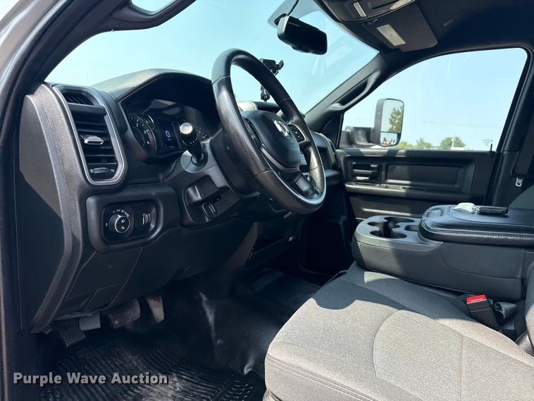 image for item NU9594 2022 RAM 5500 Crew Cab flatbed truck