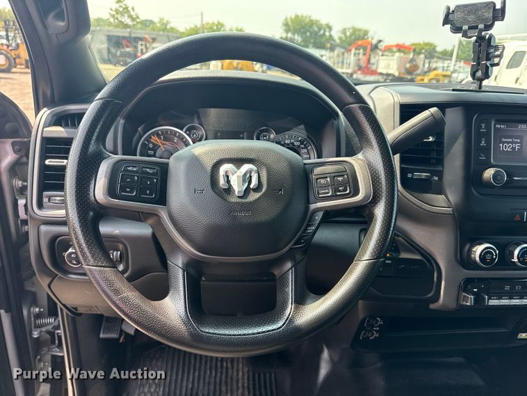 image for item NU9594 2022 RAM 5500 Crew Cab flatbed truck