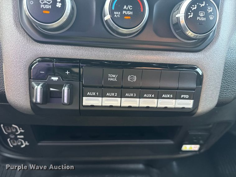 image for item NU9594 2022 RAM 5500 Crew Cab flatbed truck