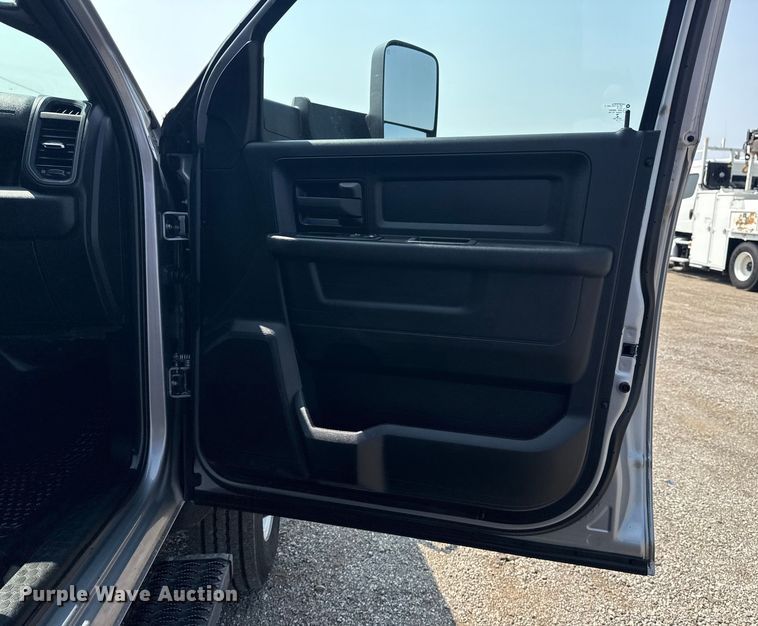 image for item NU9594 2022 RAM 5500 Crew Cab flatbed truck