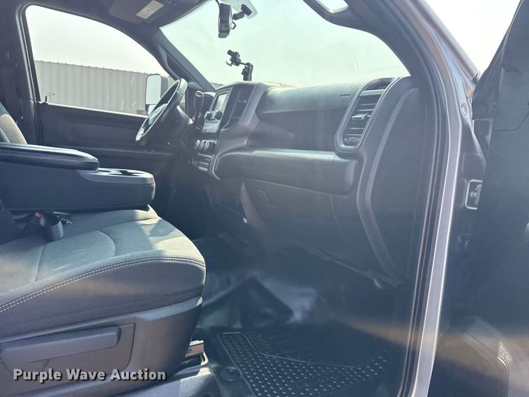 image for item NU9594 2022 RAM 5500 Crew Cab flatbed truck