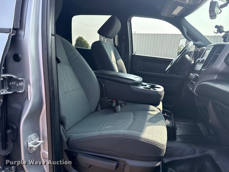 image for item NU9594 2022 RAM 5500 Crew Cab flatbed truck