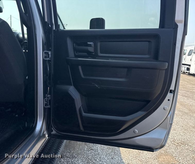 image for item NU9594 2022 RAM 5500 Crew Cab flatbed truck