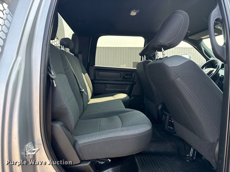 image for item NU9594 2022 RAM 5500 Crew Cab flatbed truck